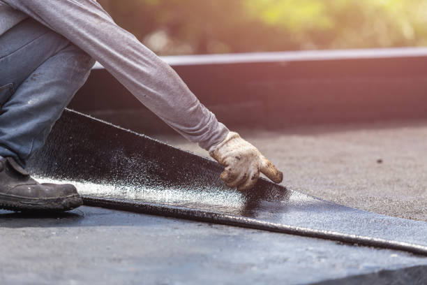 Professional Emergency Waterproofing technician working in Burnsville, NC